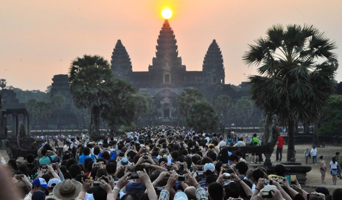 Sun on top of angkor wat